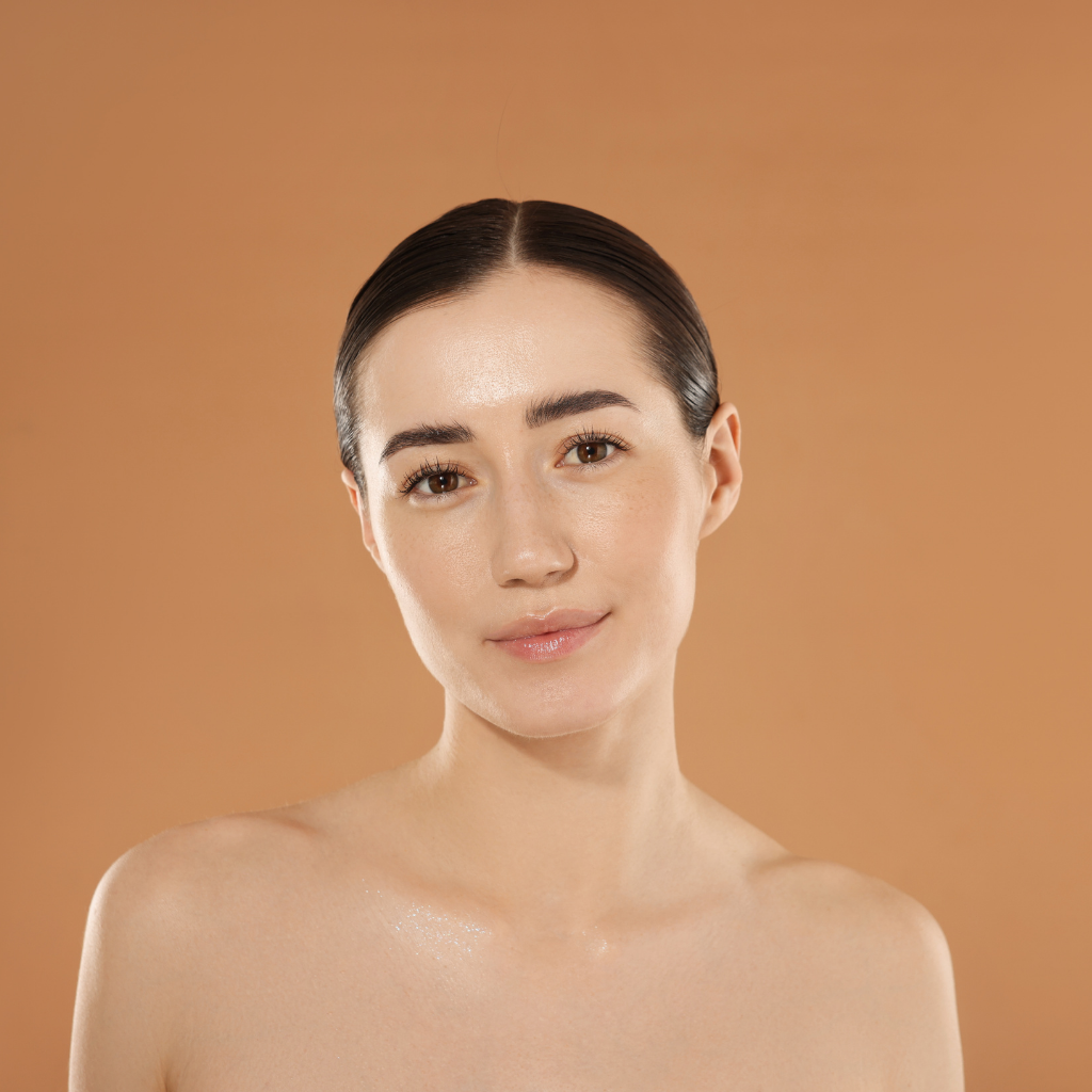 beautiful woman looking at the camera after sofwave treatment